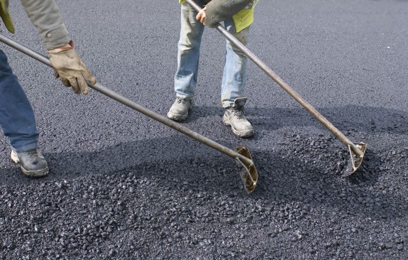 Local Driveway Blacktop Installation pros at work